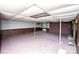 Unfinished basement space, ready to be customized with painted concrete floor and support beams at 134 Piedmont Dr, Kannapolis, NC 28081