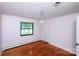 Inviting bedroom with natural light from a window and hardwood floors at 134 Piedmont Dr, Kannapolis, NC 28081