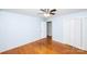 Comfortable bedroom with hardwood floors, ceiling fan, and a closet at 134 Piedmont Dr, Kannapolis, NC 28081