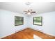 Cozy bedroom with natural light from two windows and hardwood floors at 134 Piedmont Dr, Kannapolis, NC 28081