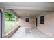 Covered carport of a brick house with brick column and a concrete floor at 134 Piedmont Dr, Kannapolis, NC 28081
