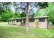 Charming brick home with well-maintained lawn and a welcoming front entrance at 134 Piedmont Dr, Kannapolis, NC 28081