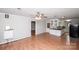 Spacious kitchen with white cabinets offering ample room for dining at 134 Piedmont Dr, Kannapolis, NC 28081