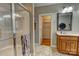 Bathroom featuring a glass shower with a towel rack and a vanity with a mirror at 138 Victoria Park Dr # 170, Shelby, NC 28150