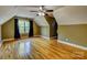 Spacious bedroom featuring hardwood floors, ceiling fan, natural lighting, and neutral paint at 138 Victoria Park Dr # 170, Shelby, NC 28150