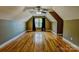 Large bonus room features hardwood floors and a window with black out curtains at 138 Victoria Park Dr # 170, Shelby, NC 28150
