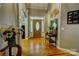 Inviting foyer with hardwood floors, complemented by a glass-paneled front door at 138 Victoria Park Dr # 170, Shelby, NC 28150