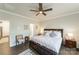 Comfortable bedroom with a ceiling fan, and hardwood floors at 15520 Capps Rd, Charlotte, NC 28278