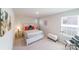 Comfortable bedroom with a bed, side table, and sitting area at 15520 Capps Rd, Charlotte, NC 28278