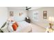 Comfortable bedroom featuring a ceiling fan and plenty of sunlight at 15520 Capps Rd, Charlotte, NC 28278