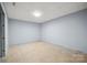 Unfinished basement offers a blank canvas for customization and expansion at 1592 Farmington Hills Dr, Conover, NC 28613
