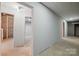 Unfinished basement with concrete flooring and multiple doorways at 1592 Farmington Hills Dr, Conover, NC 28613