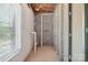 Unfinished basement with bare walls and a window at 1592 Farmington Hills Dr, Conover, NC 28613
