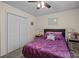 Lovely bedroom with plush carpet, side tables, a ceiling fan and generous closet space at 16070 Palawan Ct, Tega Cay, SC 29708