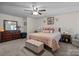 Relaxing bedroom with a plush bed, carpet flooring, and stylish furniture at 16070 Palawan Ct, Tega Cay, SC 29708