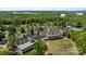 Clubhouse with large parking lot, tennis courts, and a view of the water tower at 16070 Palawan Ct, Tega Cay, SC 29708