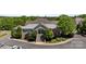 Inviting clubhouse exterior featuring well-manicured landscaping and a grand entrance staircase at 16070 Palawan Ct, Tega Cay, SC 29708