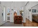 Bright foyer with wood floors, unique wall cutouts, and a clear view to the living areas at 16070 Palawan Ct, Tega Cay, SC 29708
