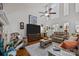 Inviting living room features high ceilings, a ceiling fan, and comfortable seating arrangement at 16070 Palawan Ct, Tega Cay, SC 29708