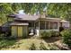 Backyard view with deck, a screened porch, and shed at 16070 Palawan Ct, Tega Cay, SC 29708