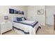Comfortable bedroom with neutral carpet and walls, large bed and matching white furniture at 1670 Tranquility Blvd, Lancaster, SC 29720