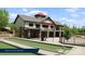 Community clubhouse with a bocce court and inviting outdoor spaces for social gatherings at 1670 Tranquility Blvd, Lancaster, SC 29720