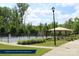 Active community life showcased by pickleball courts and covered seating areas surrounded by greenery at 1670 Tranquility Blvd, Lancaster, SC 29720