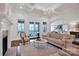 Spacious living room with fireplace, hardwood floors, and open floor plan at 17909 Golden Meadow Ct, Davidson, NC 28036