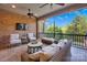 Relaxing screened porch with comfortable seating and views of the outdoor space at 17909 Golden Meadow Ct, Davidson, NC 28036