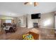 Spacious living room with hardwood floors and cozy furnishings at 1821 Hopewell Church Rd, Hiddenite, NC 28636