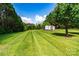 Beautifully kept lawn with a barn to enjoy your outdoor activities at 186 Ellendale Ln, Taylorsville, NC 28681