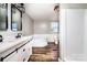 Bathroom featuring double vanity, soaking tub, and modern lighting at 186 Ellendale Ln, Taylorsville, NC 28681