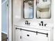 Bathroom featuring double vanity, modern lighting and fixtures at 186 Ellendale Ln, Taylorsville, NC 28681
