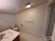 Bathroom featuring tile flooring, a single sink vanity, toilet and shower at 1869 Wooten St, Catawba, NC 28673