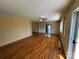 Living room featuring hardwood floors, crown molding, with neutral colors and large windows at 1869 Wooten St, Catawba, NC 28673