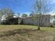 Single story home with a screened porch and steps leading to a large yard at 1869 Wooten St, Catawba, NC 28673