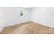 Bedroom with wood floors and a window providing natural light to the space at 1904 27Th Avenue Ne Dr, Hickory, NC 28601