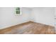Bright bedroom with hardwood floors and a window letting in natural light at 1904 27Th Avenue Ne Dr, Hickory, NC 28601