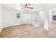 Bright bedroom with wood floors, white walls, a ceiling fan, and natural light at 1904 27Th Avenue Ne Dr, Hickory, NC 28601