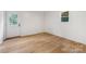 Cozy bedroom with door to the outside and a window allowing light to enter at 1904 27Th Avenue Ne Dr, Hickory, NC 28601