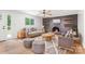 Cozy living room with a decorative fireplace, modern furniture, and bright windows at 1904 27Th Avenue Ne Dr, Hickory, NC 28601