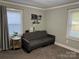 Inviting living room with a gray sofa, offering a comfortable space for relaxation and entertainment at 2122 Hope Dr, Rock Hill, SC 29730