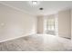 Neutral bedroom featuring new flooring, base trim and lots of natural light at 2515 Carya Pond Ln, Charlotte, NC 28212