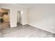 Spacious living room showcasing new flooring and entrances to other rooms at 2515 Carya Pond Ln, Charlotte, NC 28212