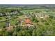 Wide aerial shot showing homes, open land, and construction in a suburban neighborhood at 2668 Polo Ln, Maiden, NC 28650