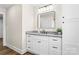 Bathroom with modern vanity, gray countertops, sleek black fixtures, and neutral decor at 2668 Polo Ln, Maiden, NC 28650