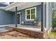 Inviting front porch with seating area, perfect for enjoying the outdoors at 2668 Polo Ln, Maiden, NC 28650