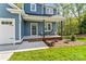 Inviting front porch with seating area, perfect for enjoying the outdoors at 2668 Polo Ln, Maiden, NC 28650