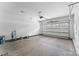 Clean, spacious garage with concrete flooring and an automatic door provides ample space for vehicles at 2668 Polo Ln, Maiden, NC 28650