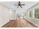 Spacious open-concept living area with hardwood floors connecting to the kitchen at 2668 Polo Ln, Maiden, NC 28650